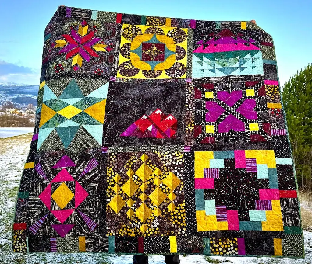 Solstice Sampler Quilt i vinden