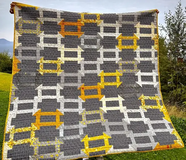 Churn Dash Quilt i vinden
