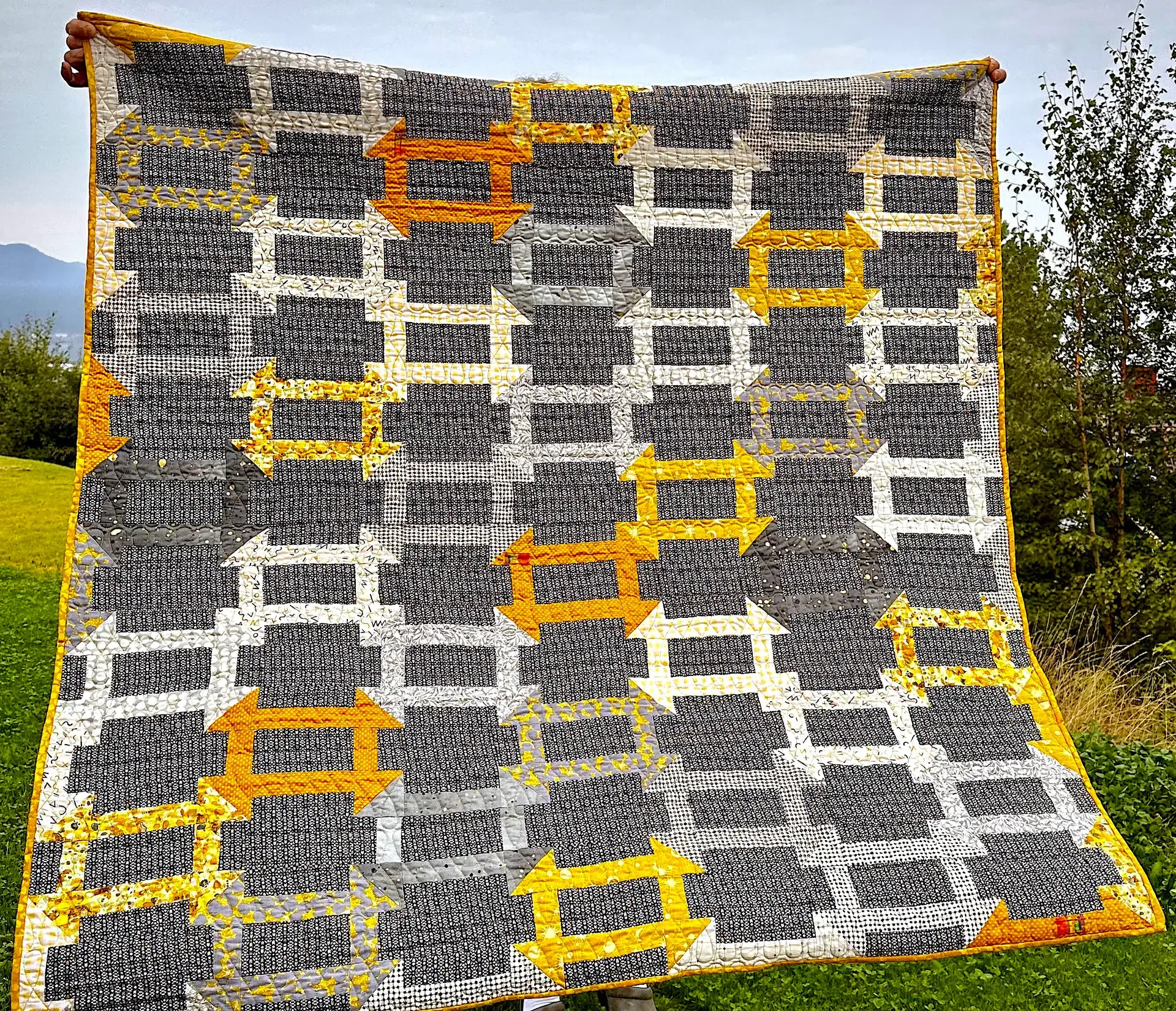 Churn Dash Quilt i vinden