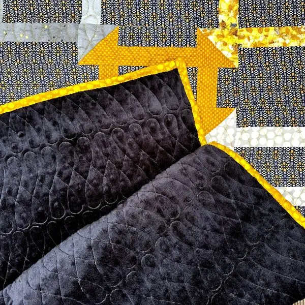 Churn Dash Quilt Nærbilde