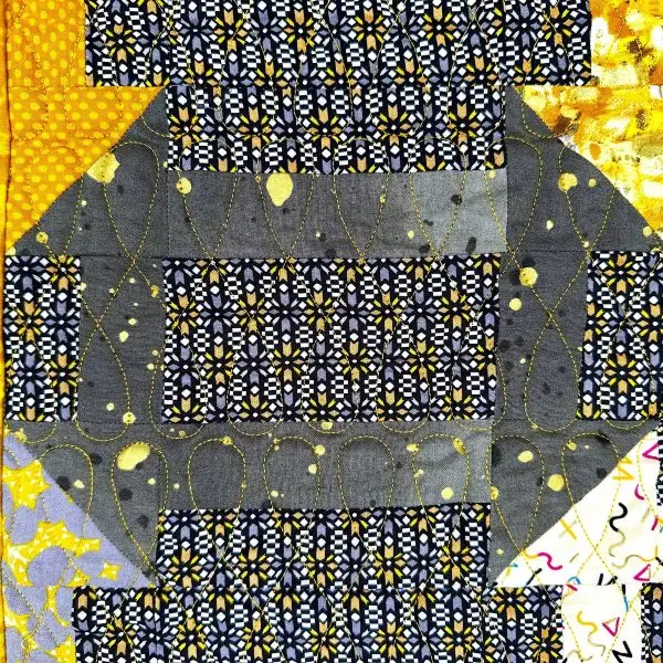 Churn Dash Quilt Nærbilde