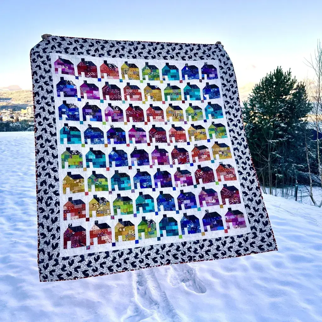 Rainbow Village Quilt i snøen