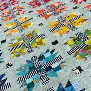 Nærbilde av Paw Flowers Quilt