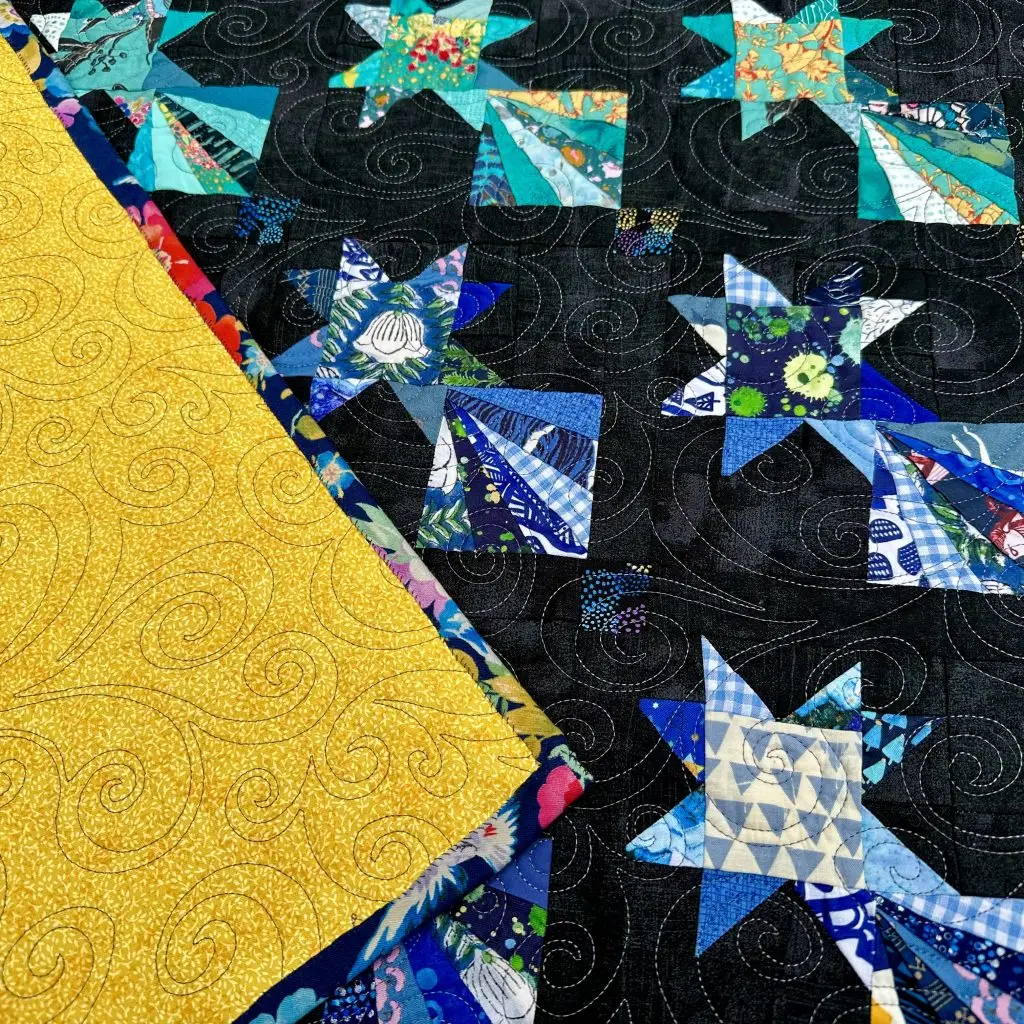 Nærbilde av Cosmic Stars Quilt
