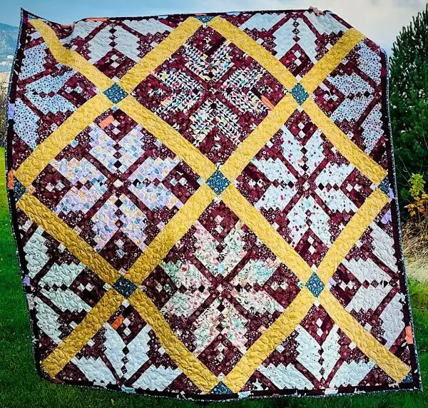 Knitted Star Quilt i vinden