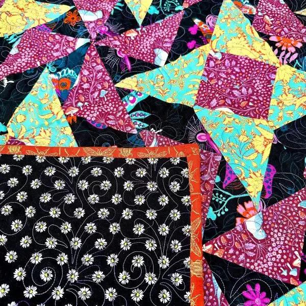 Dutchmans Puzzle Quilt nærbilde